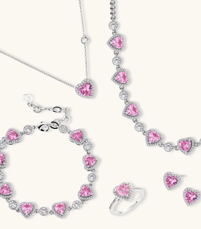 Pink heart-shaped cubic zirconia jewelry set with white gold plating featuring necklace, earrings, bracelet and ring